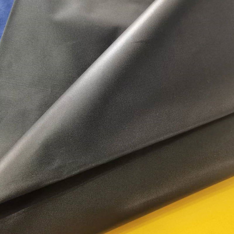 TMIE-08-1-3 Légáteresztő ruhavászon szélesség 115 cm Súly 90 GSM Összetevő poliészter, sima polírozott poliészter poplin szövettel festve